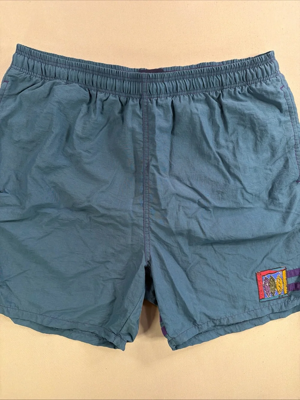 Vintage Men's Teal Elastic-Waist Swim Trunks with Embroidered Logo Patch